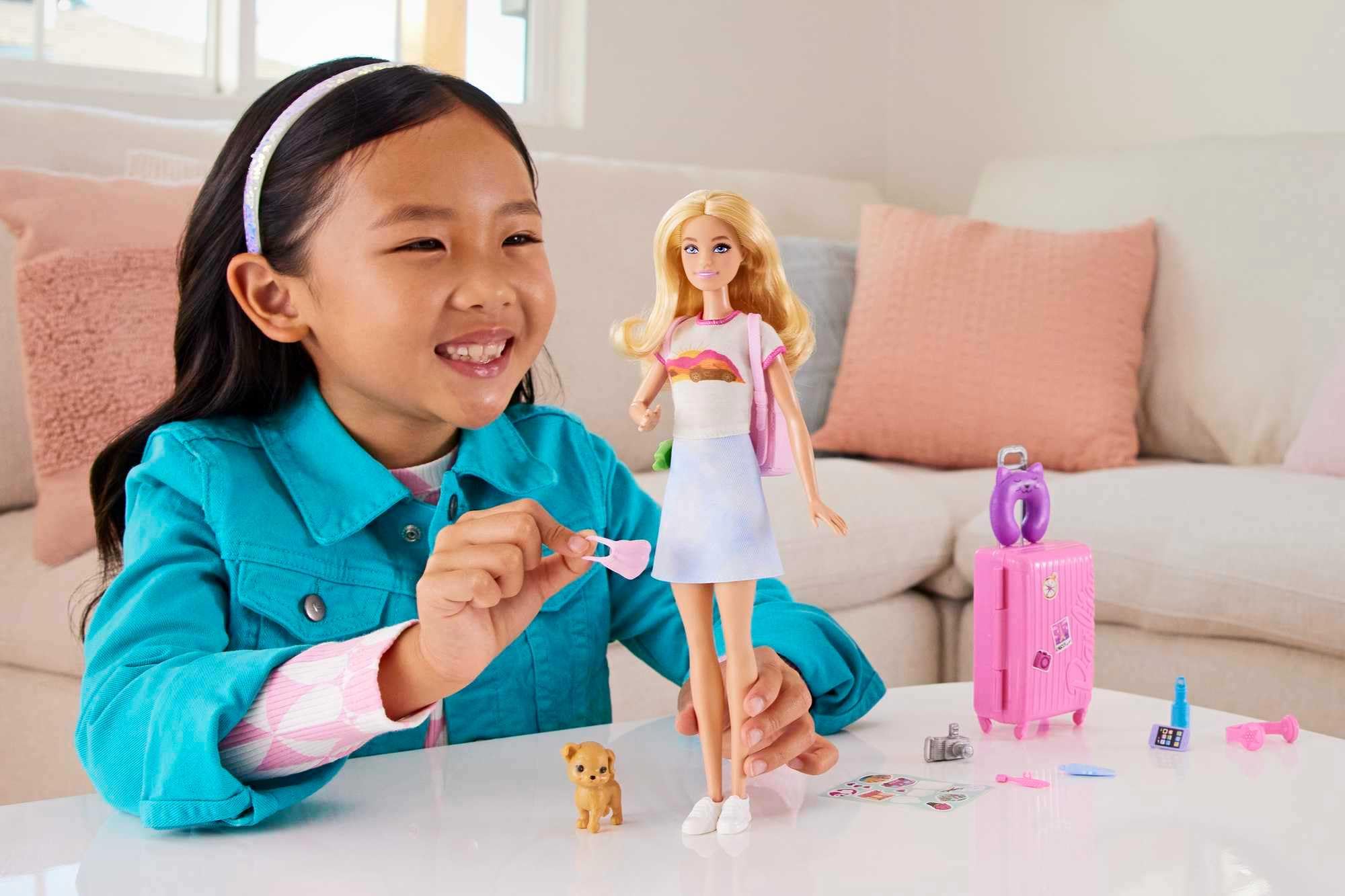 Barbie Travel Doll Set with Puppy and 10+ Accessories, Blonde Hair, Model HJY18