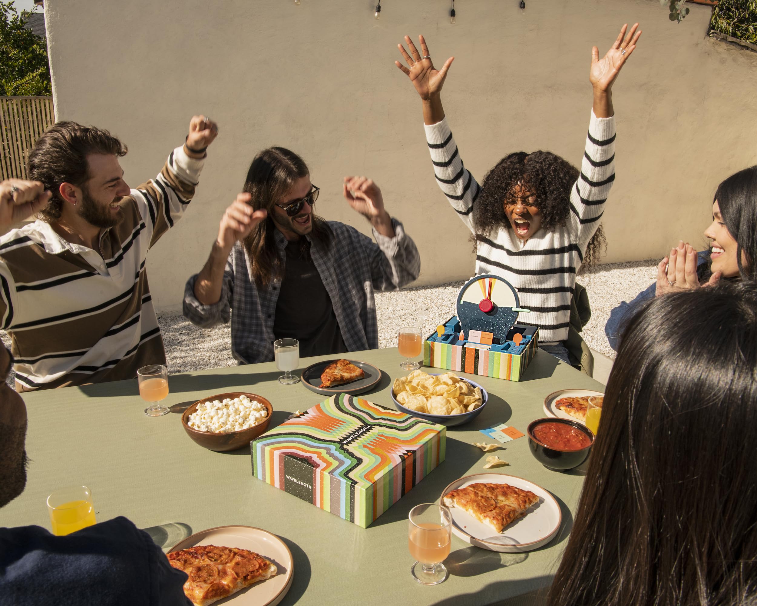 CMYK | Wavelength: A Telepathic Party Game | Ages 14+ | 2-12 Players | 30-45 Minutes Playing Time 7